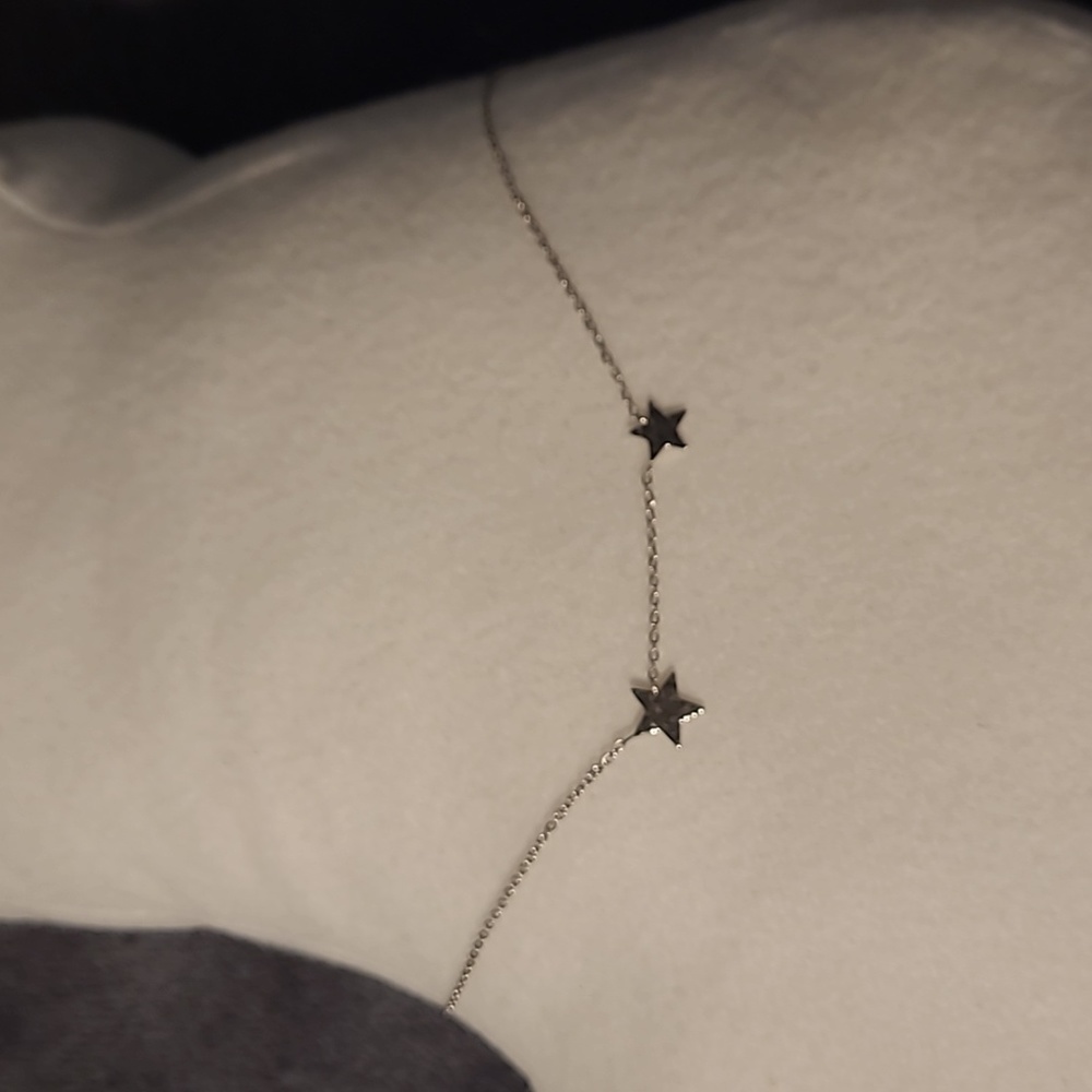 Sterling Silver necklace with two stars.
